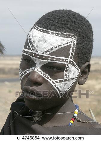 Picture - warrior, child, masai, tanzania, person, people. Fotosearch