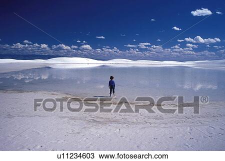 Stock Image - white, released, lake, sand, boy, model. Fotosearch