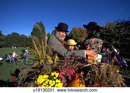 Stock Image - woman, kid, child, flowers, family. Fotosearch