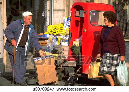 Stock Photo - woman, street, shopping, people, business. Fotosearch