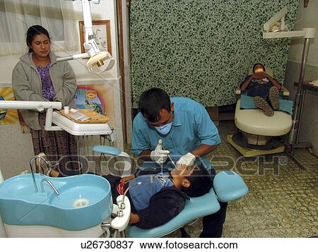 Stock Photo - work, hand, dentist, guatemala, person, people. Fotosearch