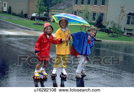Stock Photo - young, alexandria, rain, girls, three. Fotosearch