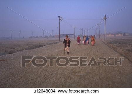 Picture - 2001, peasants, road, dirt, walking, hindu. Fotosearch