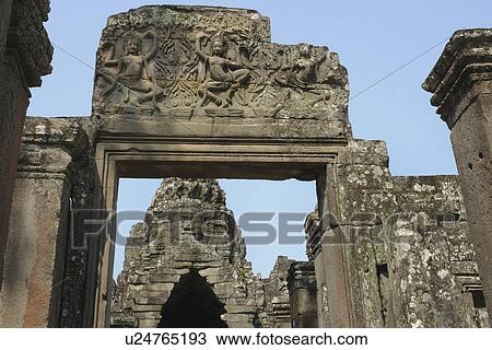 Stock Image - bayon, person, details, carving, cambodia, people. Fotosearch