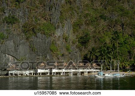 beachfront, towering, sailboat, cabanas, beach View Large Photo Image Stock Photography - beachfront, towering, sailboat, cabanas, beach. Fotosearch