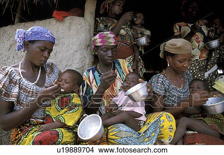 Picture - benin, people, 2560, person, child, food. Fotosearch