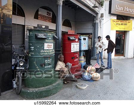 Picture - brigade, person, boxes, post, india, people. Fotosearch