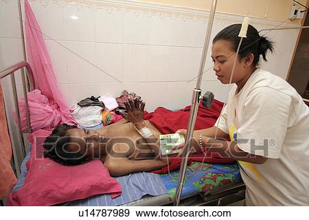 Stock Photo - cambodia, people, women, person, hand, woman. Fotosearch