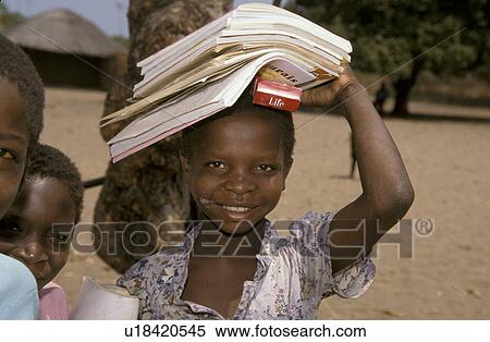 carrying, girl, mozambique, school, person, people View Large Photo Image Stock Photography - carrying, girl, mozambique, school, person, people. Fotosearch