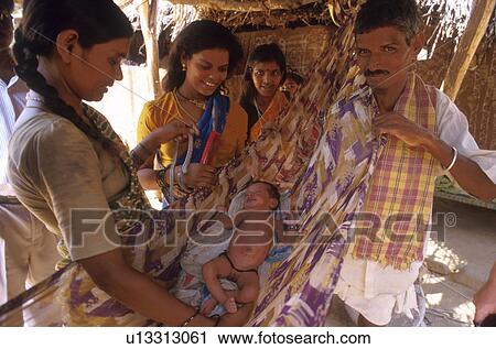 Stock Image - children, baby, person, house, people, family. Fotosearch