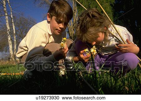 Stock Image - children, people, nature, sport, girl, flowers. Fotosearch
