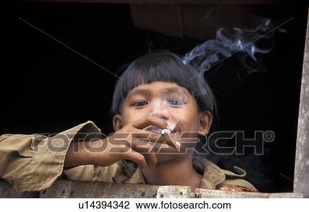 cigaret, person, smoking, boy, cambodia, people View Large Photo Image Stock Image - cigaret, person, smoking, boy, cambodia, people. Fotosearch