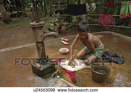 clothes, person, washing, boy, cambodia, people View Large Photo Image Stock Photo - clothes, person, washing, boy, cambodia, people. Fotosearch