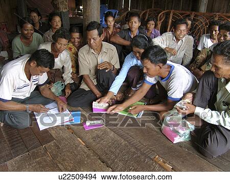 Picture - club, person, savings, cambodia, meeting, people. Fotosearch