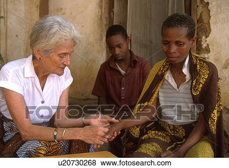 comforting, maryknoll, sister, missionary, catholic, tanzania View Large Photo Image Stock Photo - comforting, maryknoll, sister, missionary, catholic, tanzania. Fotosearch