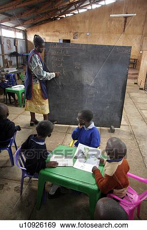 Stock Photo - day, people, kenya, book, person, background. Fotosearch