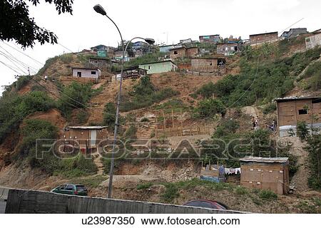 Stock Image - estanque, person, dwellings, shanty, venezuela, people. Fotosearch