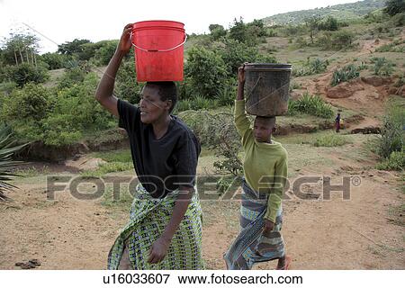 females, people, tanzania, women, person, water View Large Photo Image Stock Photo - females, people, tanzania, women, person, water. Fotosearch