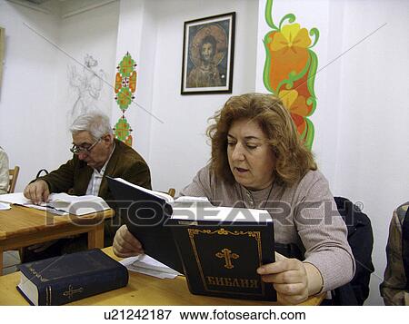 Stock Photo - females, people, women, book, person, background. Fotosearch