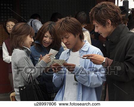 fortunes, person, reading, visitors, japan, people View Large Photo Image Stock Photograph - fortunes, person, reading, visitors, japan, people. Fotosearch