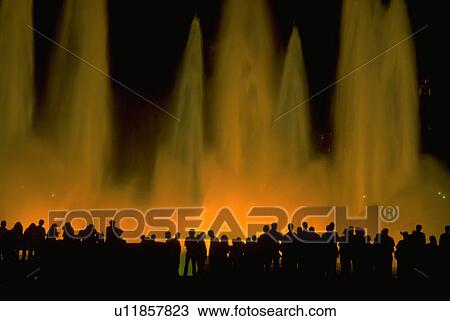 Stock Image - fountain, water, people, silhouette, party, abstract. Fotosearch