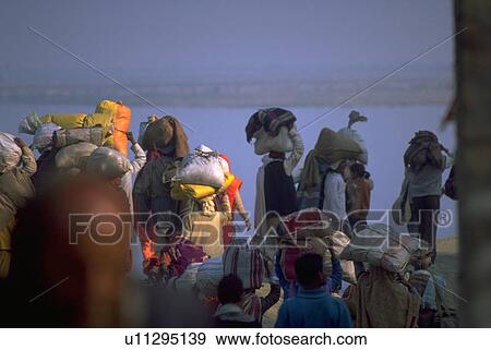 Stock Photo - ganges, peasants, heads, luggage, carrying, hindu. Fotosearch