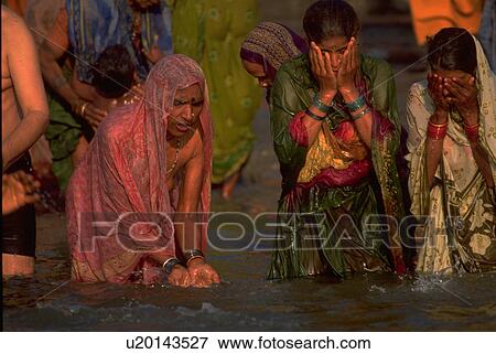 Stock Photo - ganges, women, bathing, females, hindu, love. Fotosearch