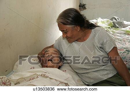 Stock Photograph - hand, sisters, venezuela, person, people. Fotosearch