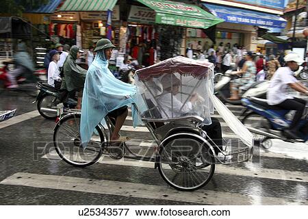 Stock Photo - hanoi, person, scene, street, vietnam, people. Fotosearch