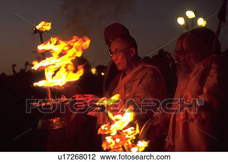 Stock Image - holding, sun, lama, dalai, fire, love. Fotosearch