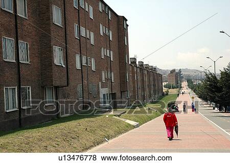 Stock Photo - housing, house, colombia, home, person, people. Fotosearch