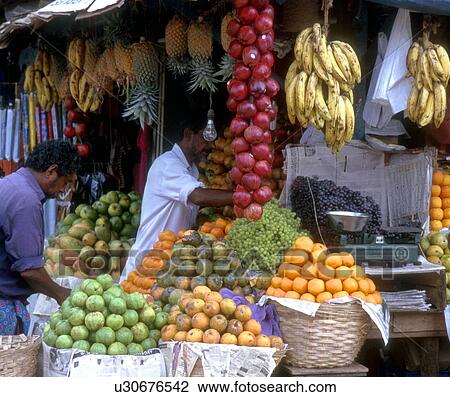 Stock Image - india, people, 5312, person, fruit, food. Fotosearch