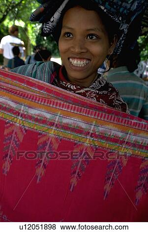 Stock Photo - indonesia, pretty, bali, fabric, teeth, smile. Fotosearch