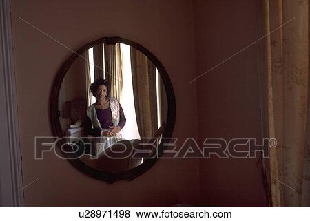Stock Photo - jamaica, house, mirror, reflected, female, woman. Fotosearch