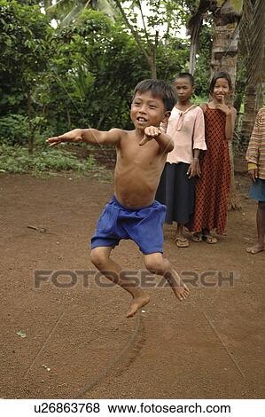 kampong, person, skipping, boy, cambodia, people View Large Photo Image Stock Photo - kampong, person, skipping, boy, cambodia, people. Fotosearch
