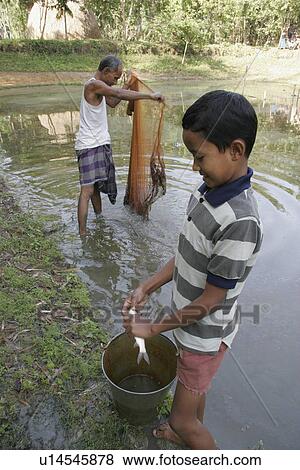kid, child, children, fish, person, people View Large Photo Image Stock Photo - kid, child, children, fish, person, people. Fotosearch