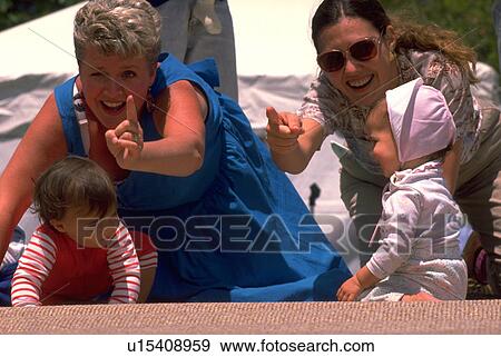 Stock Photo - kid, people, children, child, girl, family. Fotosearch