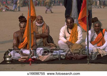 Stock Photography - kumbhmela, seated, 2001, facepaint, worshipers, party. Fotosearch