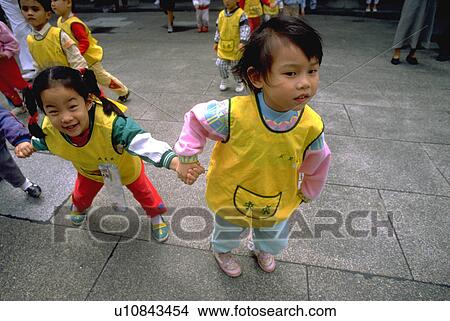 laughing, schoolgirls, friends, taiwan, taipai, two View Large Photo Image Picture - laughing, schoolgirls, friends, taiwan, taipai, two. Fotosearch