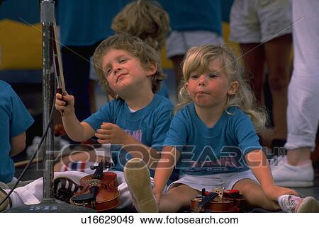 Stock Photo - learning, girl, boy, children, sport, people. Fotosearch