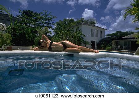 lies, woman, bikini, black, female, young View Large Photo Image Stock Image - lies, woman, bikini, black, female, young. Fotosearch