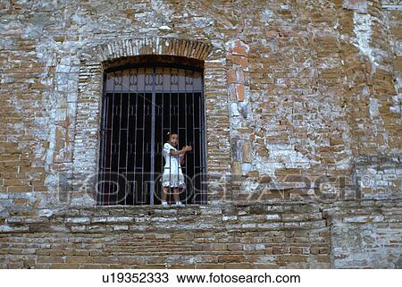 Stock Image - looking, child, window, church, kid, girl. Fotosearch