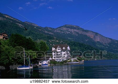 Stock Photo - lucerne, white, lake, blue, hotel, boats. Fotosearch