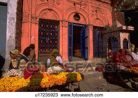Stock Image - market, sharing, sellers, costumers, flowers. Fotosearch