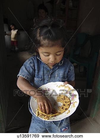 meal, girl, eating, honduras, person, people View Large Photo Image Stock Photo - meal, girl, eating, honduras, person, people. Fotosearch