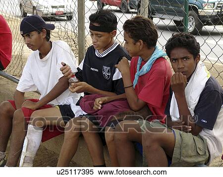 Stock Photography - members, football, gang, nicaragua, person, people. Fotosearch