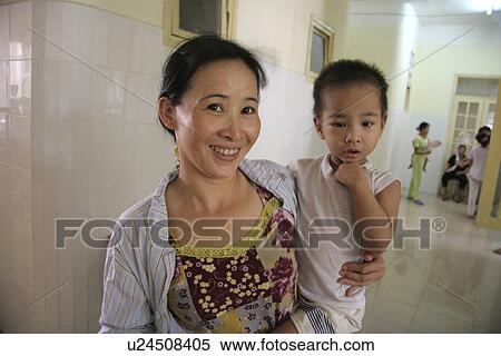 Stock Photography - mother, child, vietnam, kid, person, people. Fotosearch