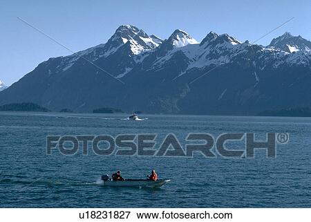 mountains, boat, alaska, bay, glacier, small View Large Photo Image Stock Photo - mountains, boat, alaska, bay, glacier, small. Fotosearch