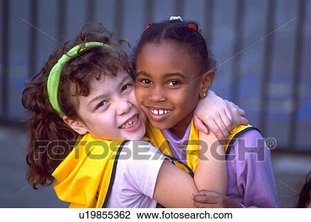 Stock Image - multi, children, multi-ethnic, girl, kids, school. Fotosearch