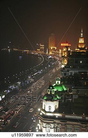 Stock Photo - night, person, shanghai, bund, china, people. Fotosearch